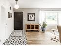 Bright entryway featuring new flooring and neutral paint at 7110 N Layman Ave, Indianapolis, IN 46250