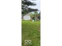 Spacious backyard featuring a shed and ample green space for outdoor activities at 7504 N Green Meadows, Fairland, IN 46126