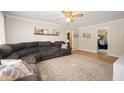 Spacious living room with comfortable seating and natural light at 9104 W Lone Beech Dr, Muncie, IN 47304