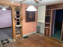 Bright living room featuring hardwood floors and unique built-in shelving at 1546 Wade St, Indianapolis, IN 46203