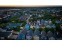 Panoramic aerial view of a neighborhood filled with colorful homes and lush green trees at 2075 Rhettsbury St, Carmel, IN 46032