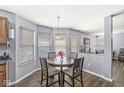Cozy dining area with natural light, perfect for Gathering meals and entertaining guests in a welcoming space at 5671 Glass Chimney Ln, Indianapolis, IN 46235