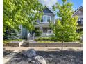 Beautiful home featuring lovely landscaping, large trees and retaining wall at 1322 Marlowe Ave, Indianapolis, IN 46202