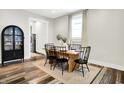 Bright dining room with a wooden table, seating for six, and modern décor at 1333 Spann Ave, Indianapolis, IN 46203