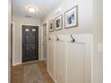 Welcoming entryway with modern accents, featuring coat hooks and stylish decor at 15388 Follow Dr, Noblesville, IN 46060