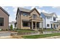 Charming two-story home featuring a second story balcony and professional landscaping at 1664 Carrollton Rail Dr, Westfield, IN 46074