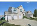 Charming home with a three-car garage and basketball hoop at 1664 Woodside Cir, Franklin, IN 46131