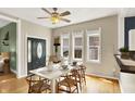 Dining room with hardwood floors and an entrance to an outdoor area at 514 Dorman St, Indianapolis, IN 46202