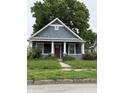 Charming single-Gathering home featuring a quaint porch and a well-maintained front yard at 1524 W 21St St, Indianapolis, IN 46202