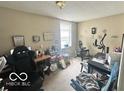 Versatile bedroom suitable for a home office or guest room, featuring natural light and ample space at 162 N Gladstone Ave, Columbus, IN 47201
