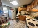 Functional kitchen with appliances, practical layout, and good space for cooking and meal preparation at 162 N Gladstone Ave, Columbus, IN 47201