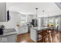 Bright, updated kitchen features white cabinets, a marble countertop, and stainless appliances at 2521 Mcleay Dr, Indianapolis, IN 46220
