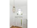 Bright foyer with a statement light fixture, soaring ceilings, and grand entrance at 3772 Christina Ct, Carmel, IN 46033