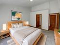 Beautifully staged main bedroom with a large bed, stylish decor, and ensuite bathroom at 4825 May Ridge Ln, Indianapolis, IN 46254
