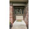 Inviting entryway with a decorative wreath and a charming welcome mat at 7093 Republic Ln, Indianapolis, IN 46259
