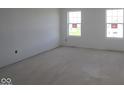 Bright bedroom featuring blank canvas and natural light with large, bright windows at 12403 Fresh Stock Dr, Noblesville, IN 46060