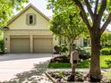 Charming home exterior with well-maintained landscaping, brick accents, and inviting curb appeal at 13069 Abraham Run, Carmel, IN 46033