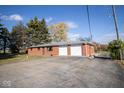 Quaint brick home with a two-car garage and long driveway at 13518 (3 Lots) Promise Rd, Fishers, IN 46038