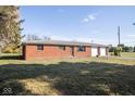 Charming brick home featuring an attached two-car garage and a well-kept front yard at 13518 (3 Lots) Promise Rd, Fishers, IN 46038