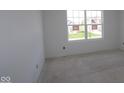 Bright, unfinished room features a large window offering ample natural light and exterior views at 16823 Cheddar Dr, Noblesville, IN 46060