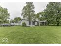 Traditional single-story home with landscaped yard at 6691 S County Road 350 W, Clayton, IN 46118