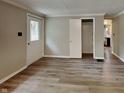 Bright living room featuring wood-look flooring and neutral wall colors at 988 Westfield Rd, Noblesville, IN 46062