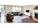 Spacious living room with a fireplace and comfortable seating at 14499 Milton Rd, Fishers, IN 46037