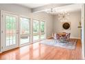Elegant dining room with stylish decor, ample natural light from large windows, and hardwood floors at 650 W Main St, Carmel, IN 46032