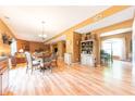 Open dining area with hardwood floors, table with chairs, and an inviting atmosphere at 977 Canary Creek Dr, Franklin, IN 46131