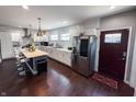 Spacious kitchen with white cabinets, stainless steel appliances and a center island at 201 N Tacoma Ave, Indianapolis, IN 46201