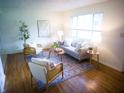 Tastefully decorated living room with a neutral color palette and comfortable furnishings at 21 Roderick Ct, Beech Grove, IN 46107