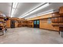 Spacious garage with ample storage, cabinets, and counter space at 2411 N County Road 500 W, Muncie, IN 47304
