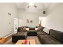 Spacious living room with vaulted ceilings and a comfortable sectional sofa at 4701 Candy Spots Dr, Indianapolis, IN 46237