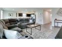 Comfortable living room featuring a plush reclining sofa and an open layout at 9829 Hulton Rd, Pendleton, IN 46064