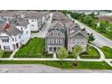 A beautiful aerial view of neighborhood homes with manicured lawns, sidewalks, and tree-lined streets at 13048 Minden Dr, Fishers, IN 46037