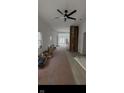 An in-progress home remodeling project is shown featuring new floors and large windows at 1318 Hoyt Ave, Indianapolis, IN 46203