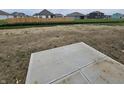 Spacious backyard featuring a concrete patio, perfect for outdoor entertaining at 2287 Oakmont Dr, Plainfield, IN 46168