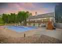 Spacious backyard with a large in-ground pool, patio area, and mature trees, great for entertaining at 4495 W Stones Crossing Rd, Greenwood, IN 46143