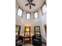 Bright and airy bonus room featuring multiple windows and comfortable seating arrangement at 1010 Lakewood N Dr, Brownsburg, IN 46112