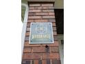 Close up of a Brookside neighborhood sign in gold lettering at 1311 N Oakland Ave, Indianapolis, IN 46201