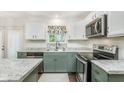 Updated kitchen with stainless steel appliances, granite countertops, and stylish cabinets at 19061 Fairfield Blvd, Noblesville, IN 46060