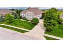 Charming single-Gathering home with well-maintained lawn and mature trees at 4420 Hickory Ridge Blvd, Greenwood, IN 46143