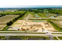 Construction site aerial showing excavators, land movers, and other equipment at 412 Elite St # 2-601, Westfield, IN 46074
