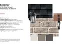 Exterior features brick, gray moor, timberline charcoal shingles and courtyard 1-light black lighting at 412 Elite St # 2-601, Westfield, IN 46074