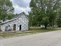View of an under-construction home sitting on a corner lot near residential streets at 6326 N Main St, Wilkinson, IN 46186