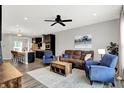 Open-concept living space with hardwood floors and seamless flow to the kitchen area at 158 Handley St, Indianapolis, IN 46222