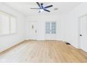 Bright living room featuring hardwood floors, neutral walls, and natural light at 201 N 11Th St, Elwood, IN 46036