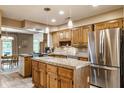 Eat-in kitchen with stainless steel appliances and center island at 5326 White Marsh Ln, Indianapolis, IN 46226