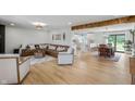 Open-concept living room flows into the kitchen and dining area, with ample seating at 10274 S 400 W, Pendleton, IN 46064