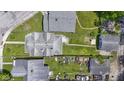 This is a bird's eye view of homes with lawn and detached garages in a suburban setting at 3636 Crescent Ave, Indianapolis, IN 46208